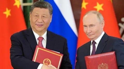 Какой состав делегации сопровождает Путина в КНР и какие вопросы будут обсуждены?