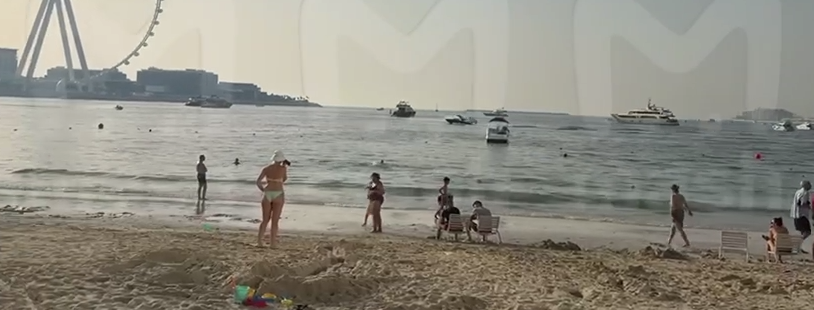 Почему туристы продолжают отдыхать на пляже Jumeirah во время работы систем ПВО в Дубае?