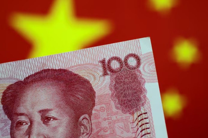 Китайские компании стремятся застраховаться от колебаний курса юаня