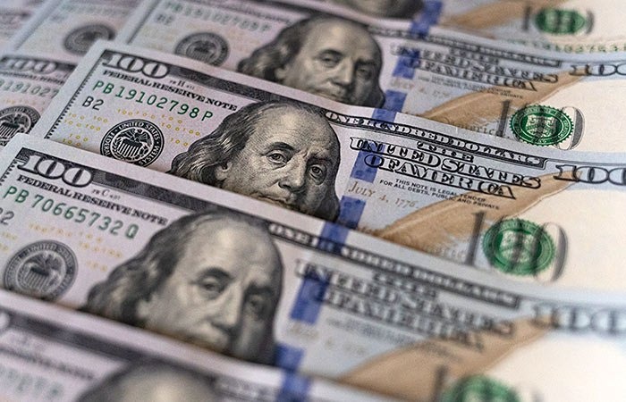 Доллар падает, золото дорожает: реакция рынка на выкуп госбондов Минфином США